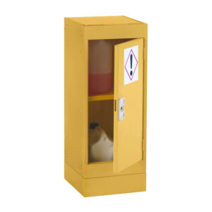 Yellow hazardous storage cupboard with warning symbol and partially open door showing containers inside